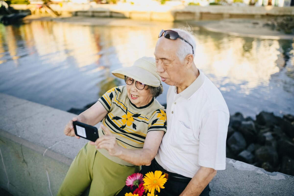 Senior couple reading Medicare enrollment documents